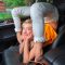 Contortion in the car. Yoga poses.